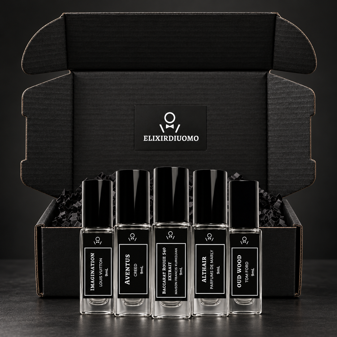 A selection of five Elixir travel sprays with the black presentation box